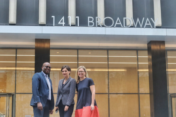 Alex Ford, Ana Meauta and Howard Dilworth outside our New York headquarters | Encompass company news