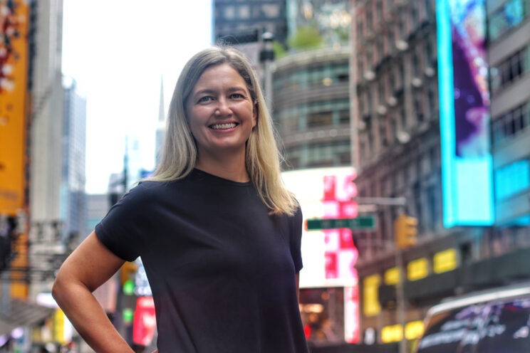 Alex Ford in Time Square at the launch of our New York office | Encompass company news